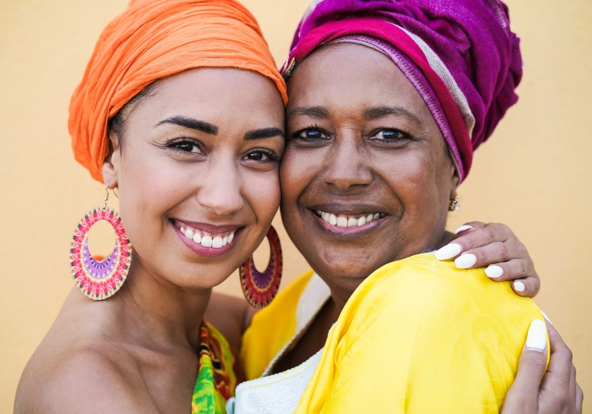 Portrait,Of,Happy,African,Mother,And,Daughter,Face,To,Face
